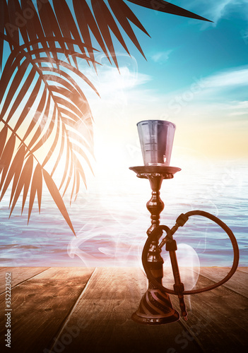 Oriental Hookah on a wooden...