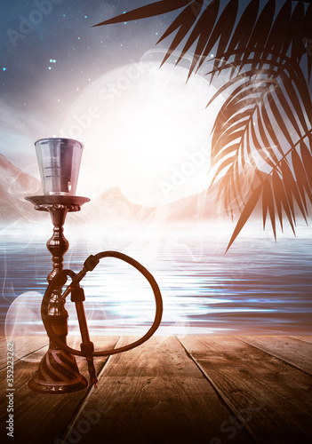 Oriental Hookah on a wooden...