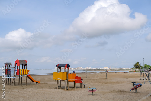 Wallpaper Mural Beaches and playgrounds closed for pandemic Covid-19. Caution tape wrapped around outdoor recreation and entertainment areas to prevent spread of virus. Empty playground in Europe, stay home concept. Torontodigital.ca