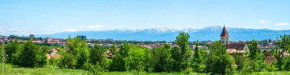 panoramic view over the Sibiu city and Fagars mountains, Romania

