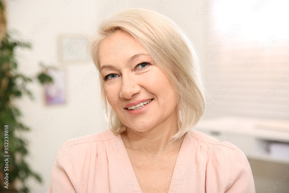 Portrait of beautiful mature woman at home Portrait of beautiful mature woman at home