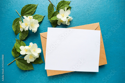 postcard mockup. spring flowers. romantic composition of white jasmine flowers. congratulation. invitation