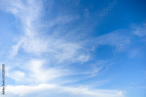 Blue sky with cirrus clouds at daytime. Natural background