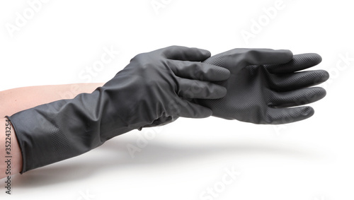Hands in rubber gloves isolated on white.