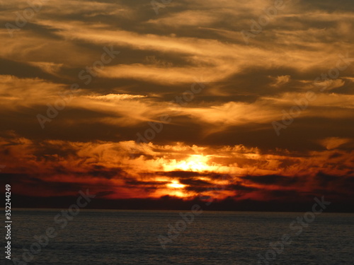 sunset over the sea © cometaroja