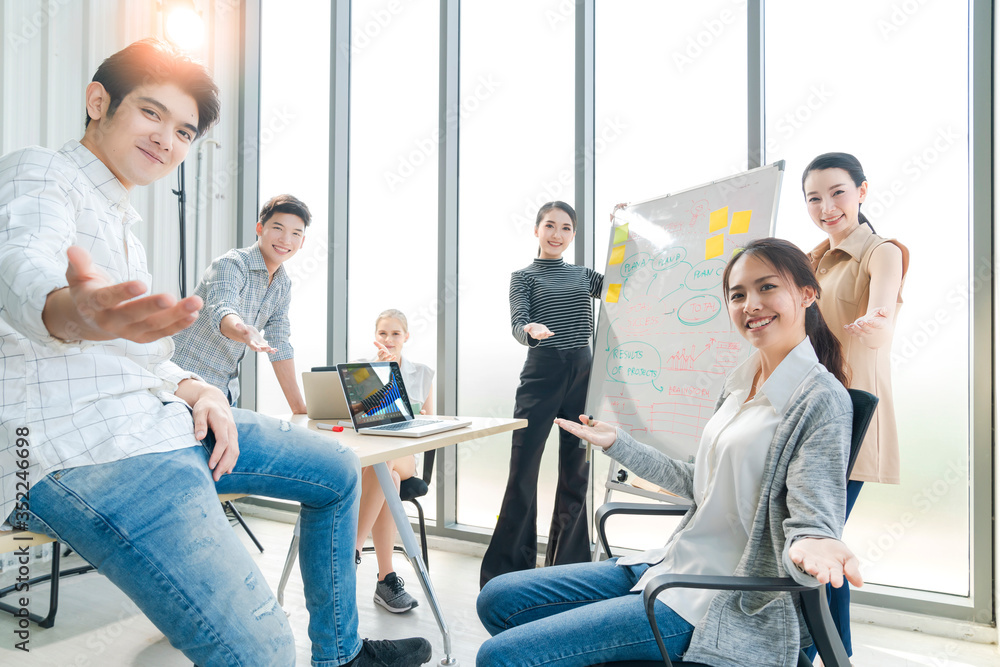 Group of asian young creative happy enjoy laugh smile and great success emotion teamwork people business startup entrepreneur casual brainstorm business meeting office background Group of asian young creative happy enjoy laugh smile and great success emotion teamwork people business startup entrepreneur casual brainstorm business meeting office background