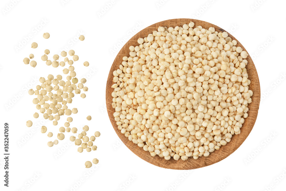 white quinoa seeds in wooden bowl isolated on white background with clipping path and full depth of field. Top view. Flat lay. white quinoa seeds in wooden bowl isolated on white background with clipping path and full depth of field. Top view. Flat lay.