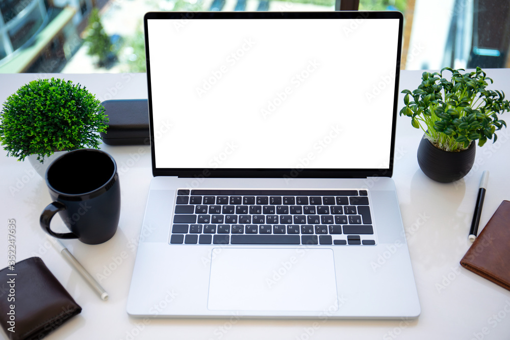 laptop with isolated screen on the table in the office laptop with isolated screen on the table in the office
