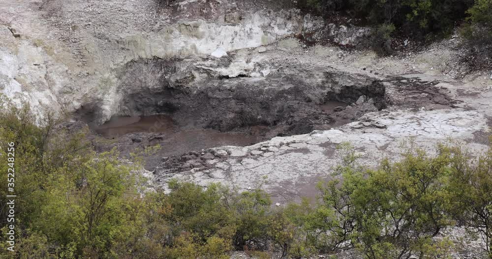 4K locked off stationary motion of boiling mud and water at bottom of a Fumarole crater at Wai-O-Tapo Thermal Wonderland near the town of Rotorua,North Island,New Zealand 4K locked off stationary motion of boiling mud and water at bottom of a Fumarole crater at Wai-O-Tapo Thermal Wonderland near the town of Rotorua,North Island,New Zealand