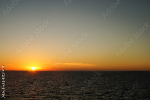 Sunset/sunrise on the ocean. Seen from a cruise © Appreciate
