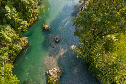 aerial view of the Serio river during the day, Val Seriana Bergamo.