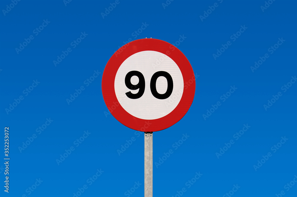 Traffic sign forbidden to drive at more than 90 speed on pole, European traffic regulations Traffic sign forbidden to drive at more than 90 speed on pole, European traffic regulations
