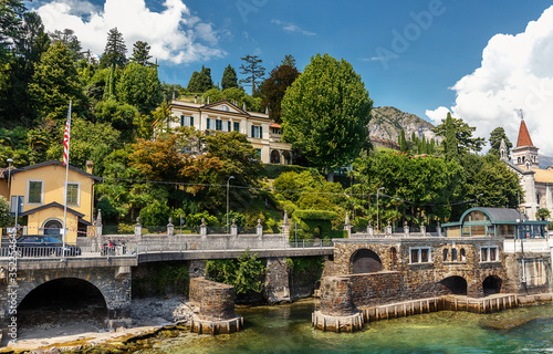 Beautiful coastline with old town by the sea in Italy. Wonderful view on    popular resort in Cadenabbia town. scenic landscapes of Lago di Como - Cadenabbia, Italy. architecture and travel concept photo