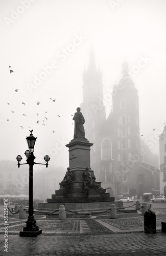 A foggy morning at Main Market Square in Krakow, Poland