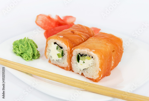 Philadelphia roll on a white background, isolated. Close-up.