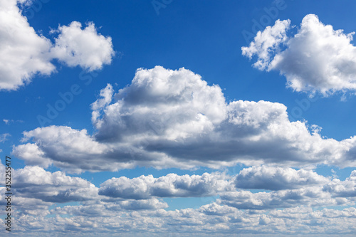 Beautiful blue sky with white clouds above the sea for background