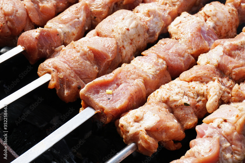 Pork meat, cut into pieces and put on skewers.