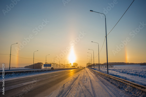 Halo sunset at morning on the road