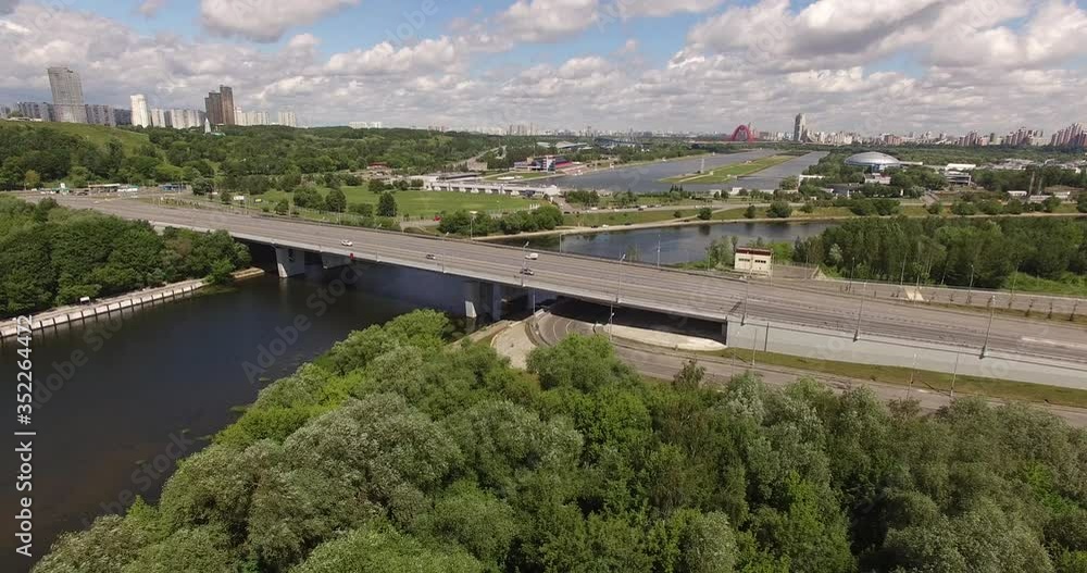 4K aerial summer late afternoon high quality video footage of new road highway, Grebnoi rowing water sports channel, cloudy sky in suburb Krilatskoye, Moscow River watercourse in Moscow, Russia 4K aerial summer late afternoon high quality video footage of new road highway, Grebnoi rowing water sports channel, cloudy sky in suburb Krilatskoye, Moscow River watercourse in Moscow, Russia