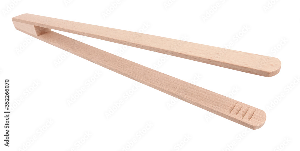 Wooden device kitchen tweezers isolated on white background Wooden device kitchen tweezers isolated on white background