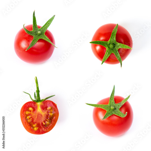 Red ripe cherry tomatoes isolated on white background.