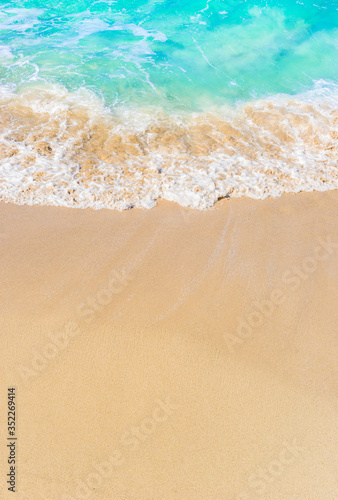 Wave on sandy beach. Panoramic background with copy space. 