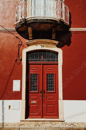 red door and building