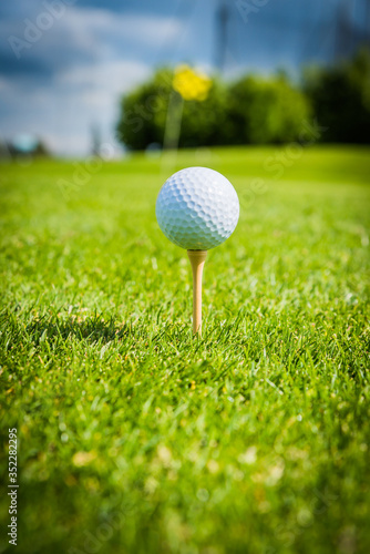 golf ball on golf green grass natural fairway