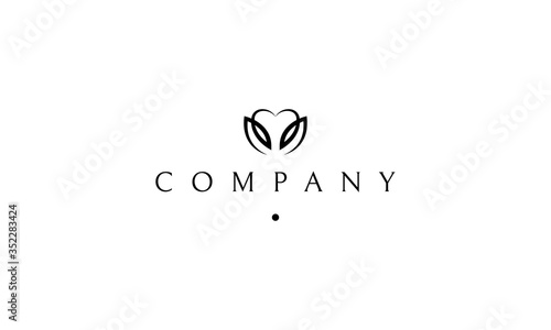 Vector logo on which an abstract image of two leaves in the form of a heart.
