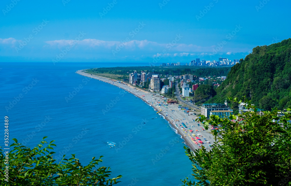 Areal panorama of Kvariaty and Batumi city, Georgia. View on town near sea. Blue water and long beach.