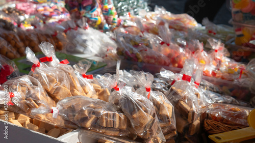 Sweets in bags at a street sale.