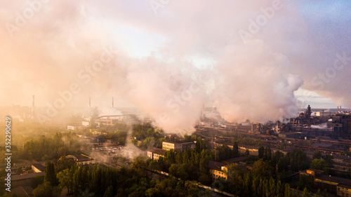 industry metallurgical plant dawn smoke smog emissions bad ecology aerial photography