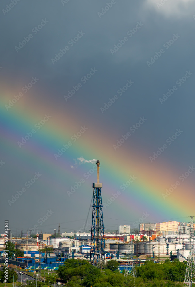 Beautiful rainbow over a petrochemical plant.