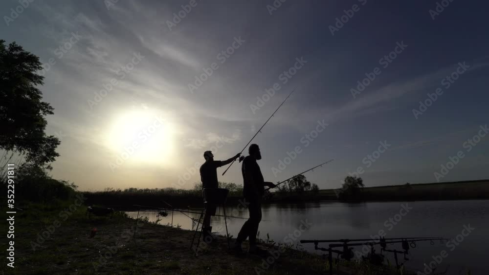 4K. Fishing, evening landscape. Technique of casting a spinning reel. Successful fishing for large fish. Fishing on vacation.