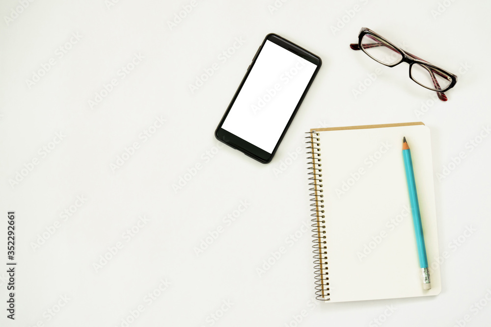 new ideas concept. notebook with copy space , paper balls, samrtphone, laptop, pencil. new ideas concept. notebook with copy space , paper balls, samrtphone, laptop, pencil.