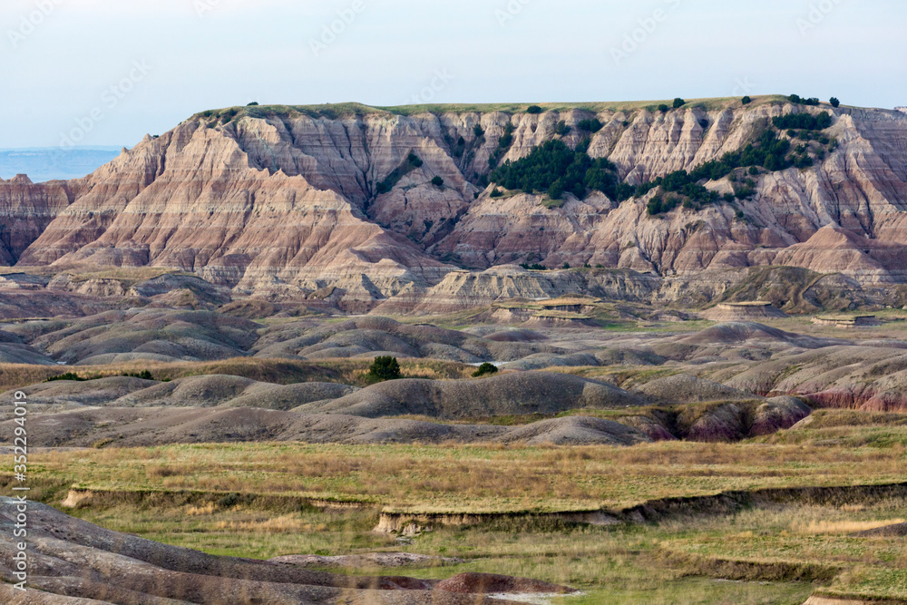 Landscape view of colorful mounds in South Dakota's Badlands National Park.