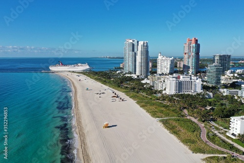 Aerial view of South Beach and Lummus Park in Miami Beach, Florida duing coronavirus beach, hotel, park and restaurant closures on sunny morning. © Francisco