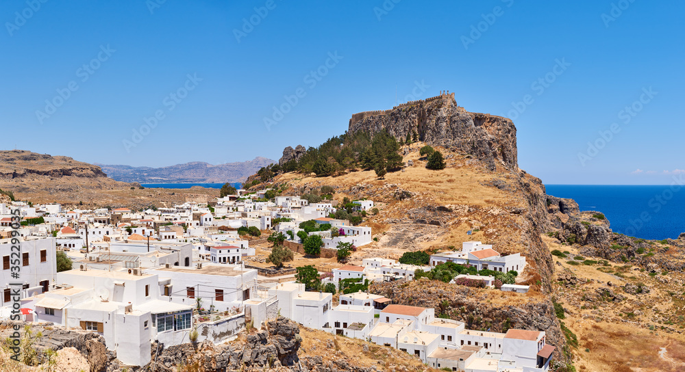 Panoramic view of Lindos village with the Acropolis on the hill. Rhodes, island, Greece