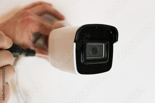 Installation of CCTV camera for home security. Videcam, smart home technology
