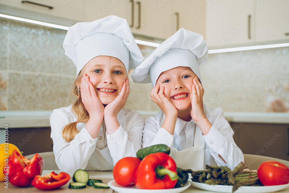 little cooks cut vegetables for salad little cooks cut vegetables for salad