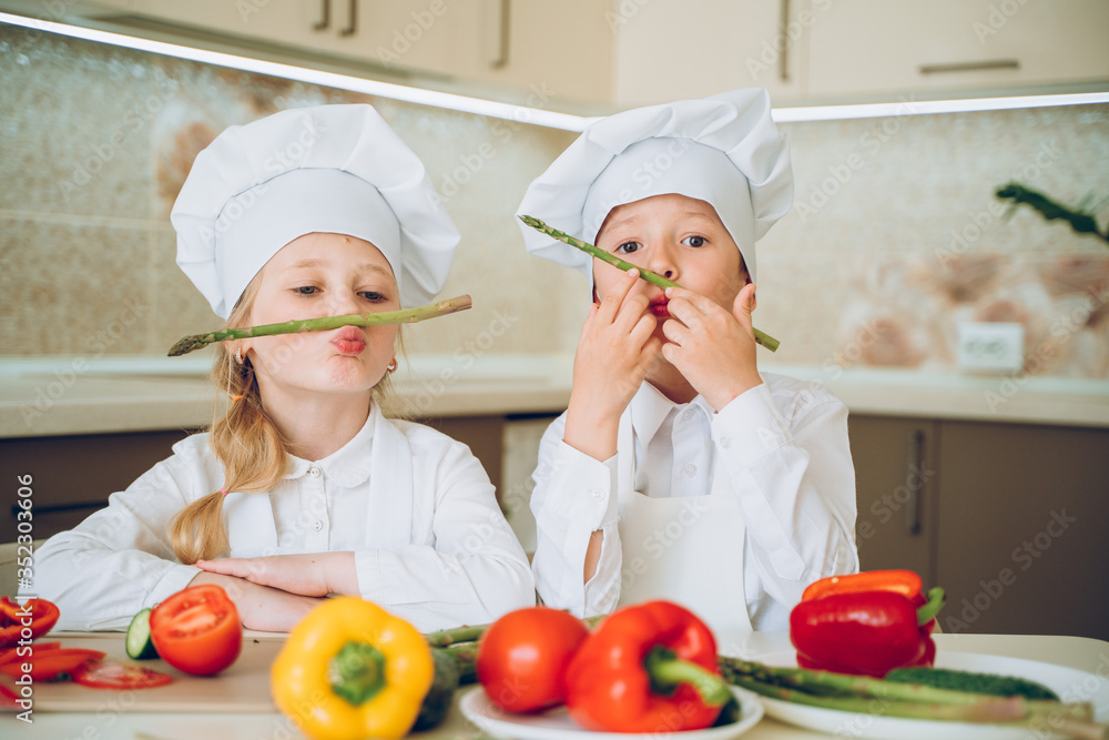 little cooks cut vegetables for salad little cooks cut vegetables for salad