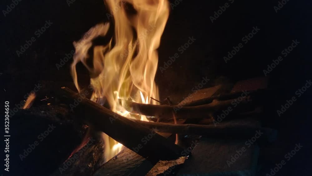 Vídeo do Stock Fireplace with wood burning in the house. Close up shot