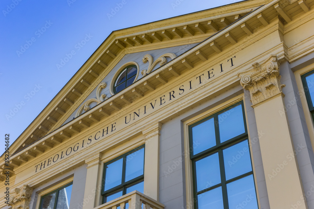Facade of the theology university in historic city Kampen, Netherlands