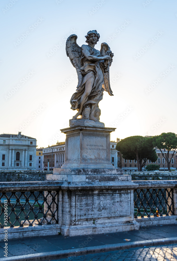 Full size statue of Angel with the Crown of Thorns on Ponte Sant'Angelo in Rome near Castel Sant'Angelo