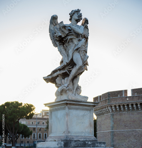 Full size statue of Angel with the Superscription on Ponte Sant'Angelo in Rome near Castel Sant'Angelo