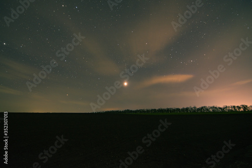 starry sky over the field  Venus