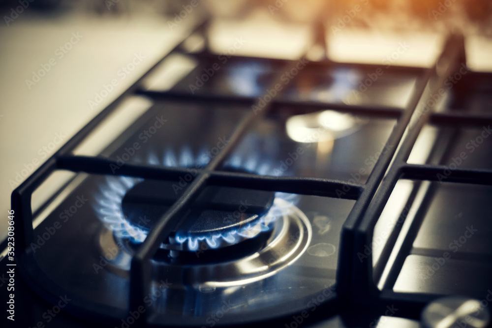 Kitchen gas cooker with burning fire propane gas Kitchen gas cooker with burning fire propane gas