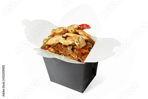 Wok noodles with chicken isolated