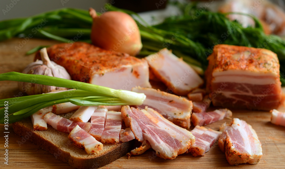 bacon onion and bread on the table
bacon onion and bread on the table