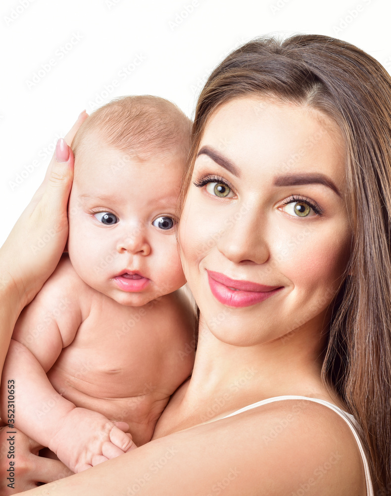 Mother and baby playing and smiling. Happy family. Mother and baby playing and smiling. Happy family.